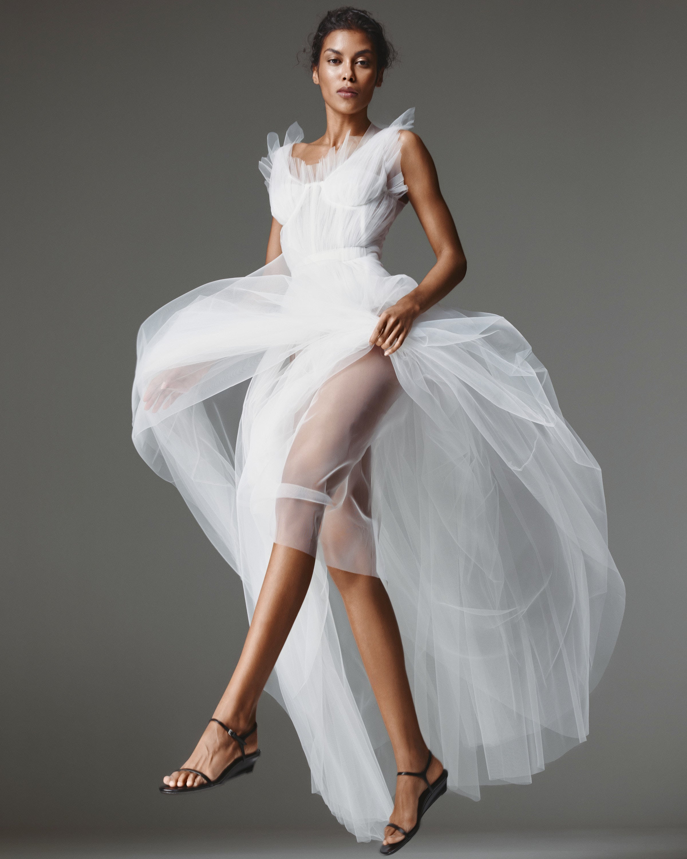 Bellini Corset Dress by J'amemme — movement view of the full sheer tulle skirt