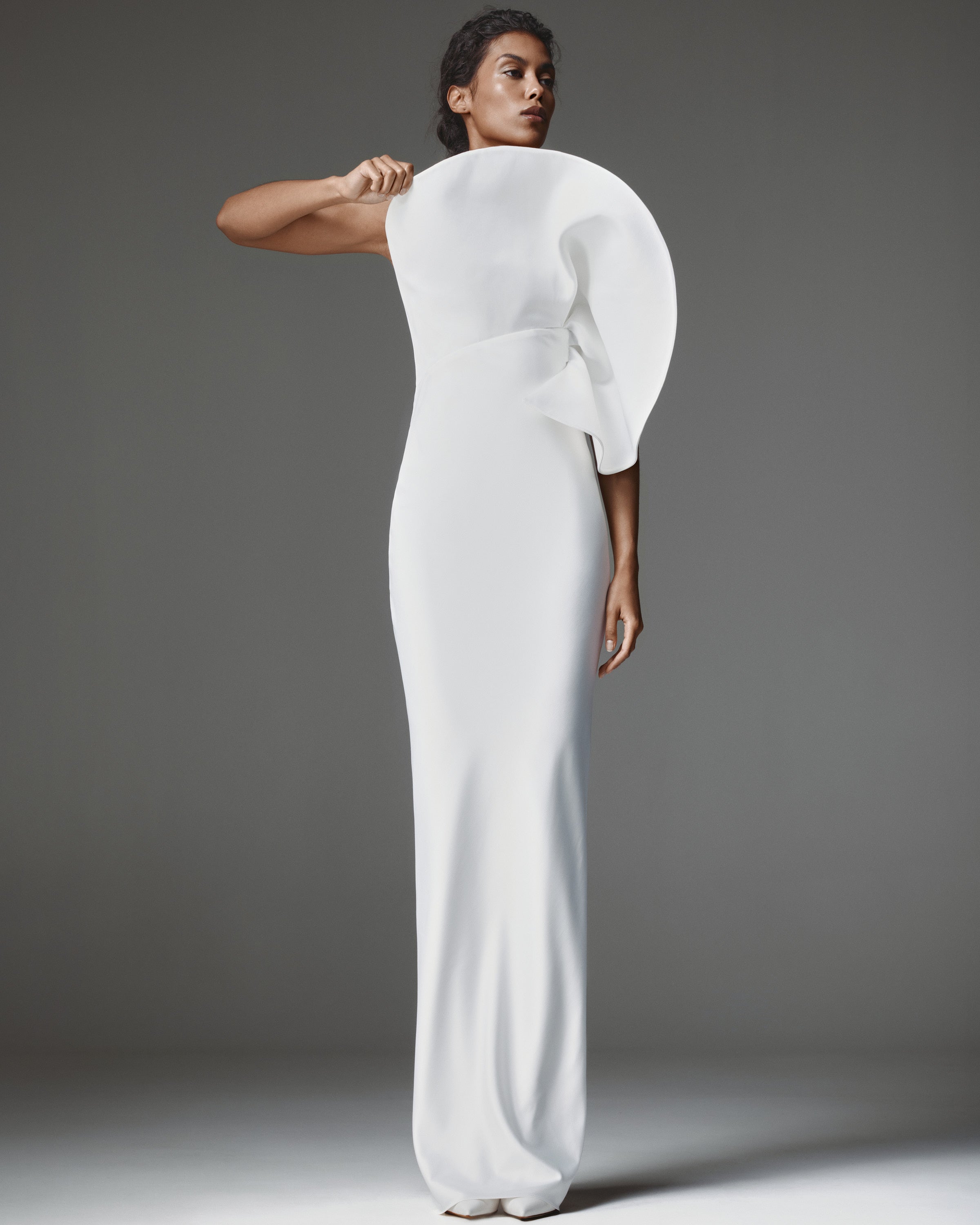 Manon Dress by J'amemme — front view of one-shoulder column gown with oversized shoulder ruffle