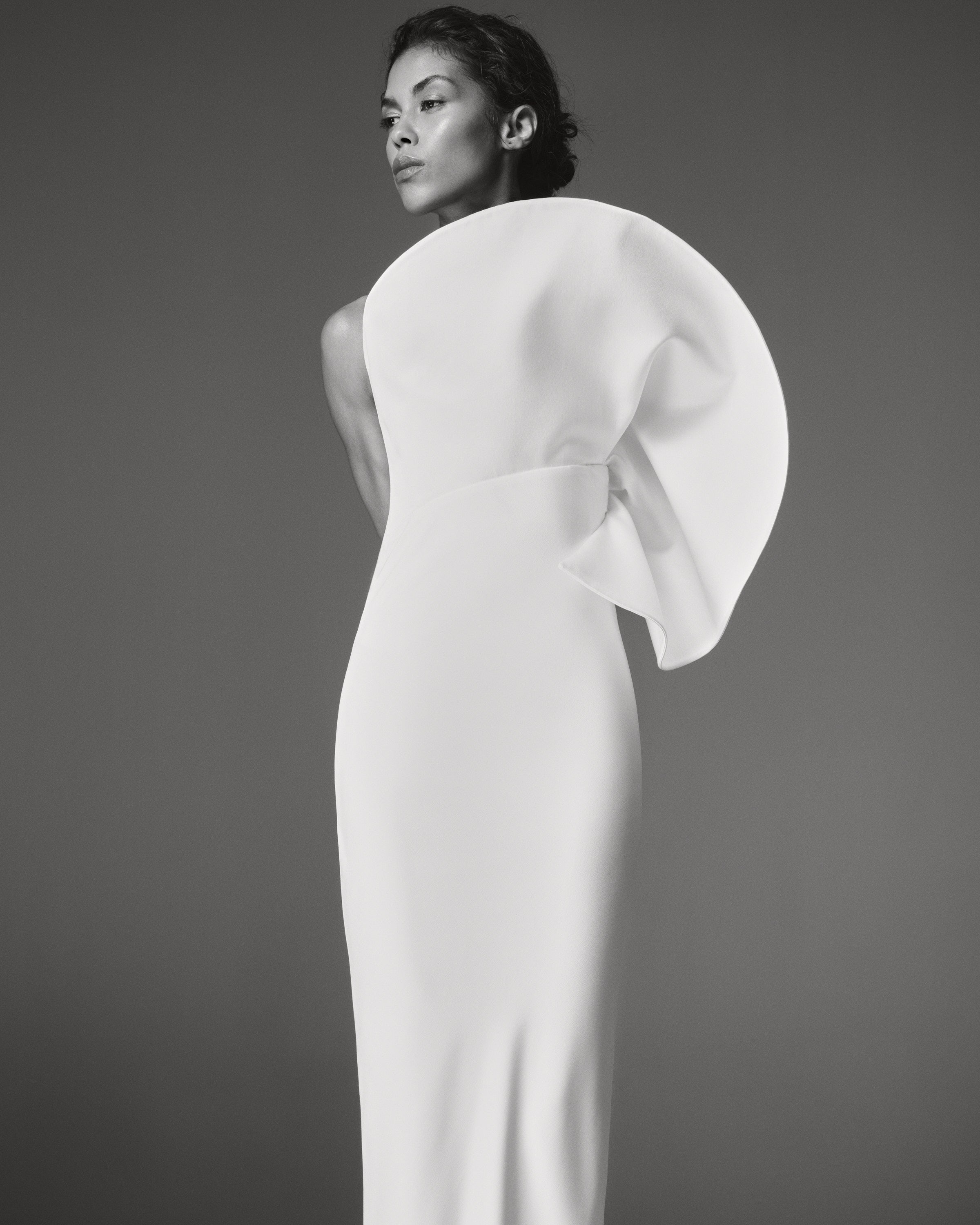 Manon Dress by J'amemme — side profile showing fitted crepe column and circular ruffle detail