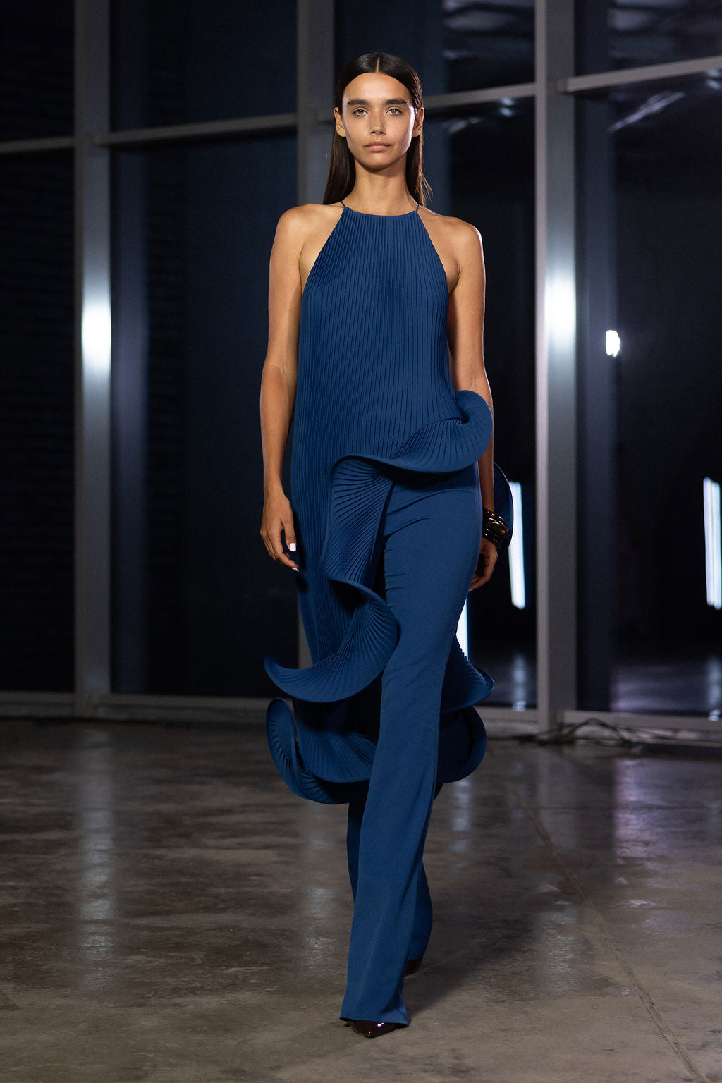 Loulou Set Navy Blue front view — handmade plissé halter top with sculptural ruffle detail and wide-leg trousers by J'amemme, runway shot
