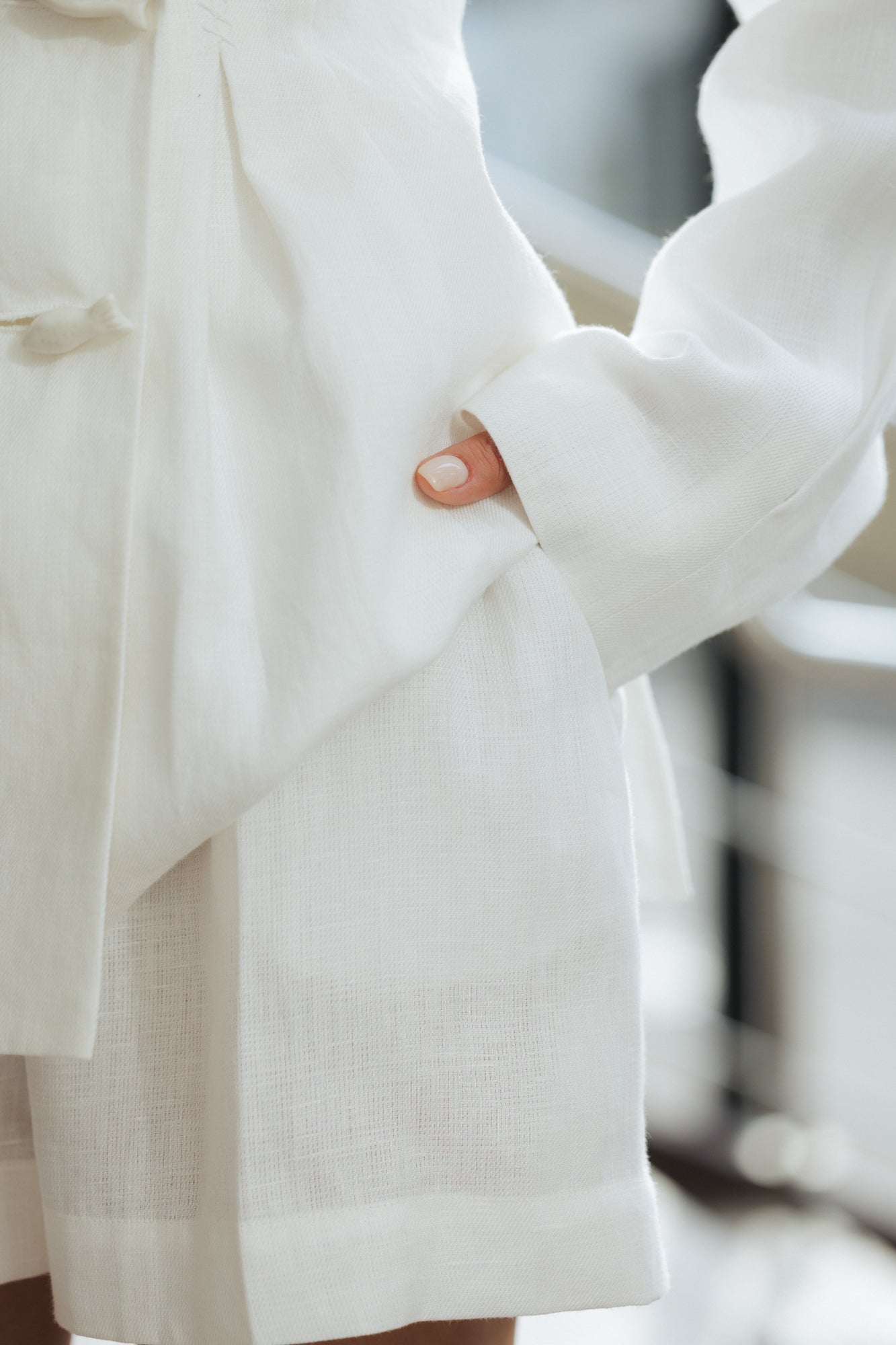 Close-up texture detail of the 100% organic linen fabric used in the Jamemme Halkidiki White Shorts and jacket