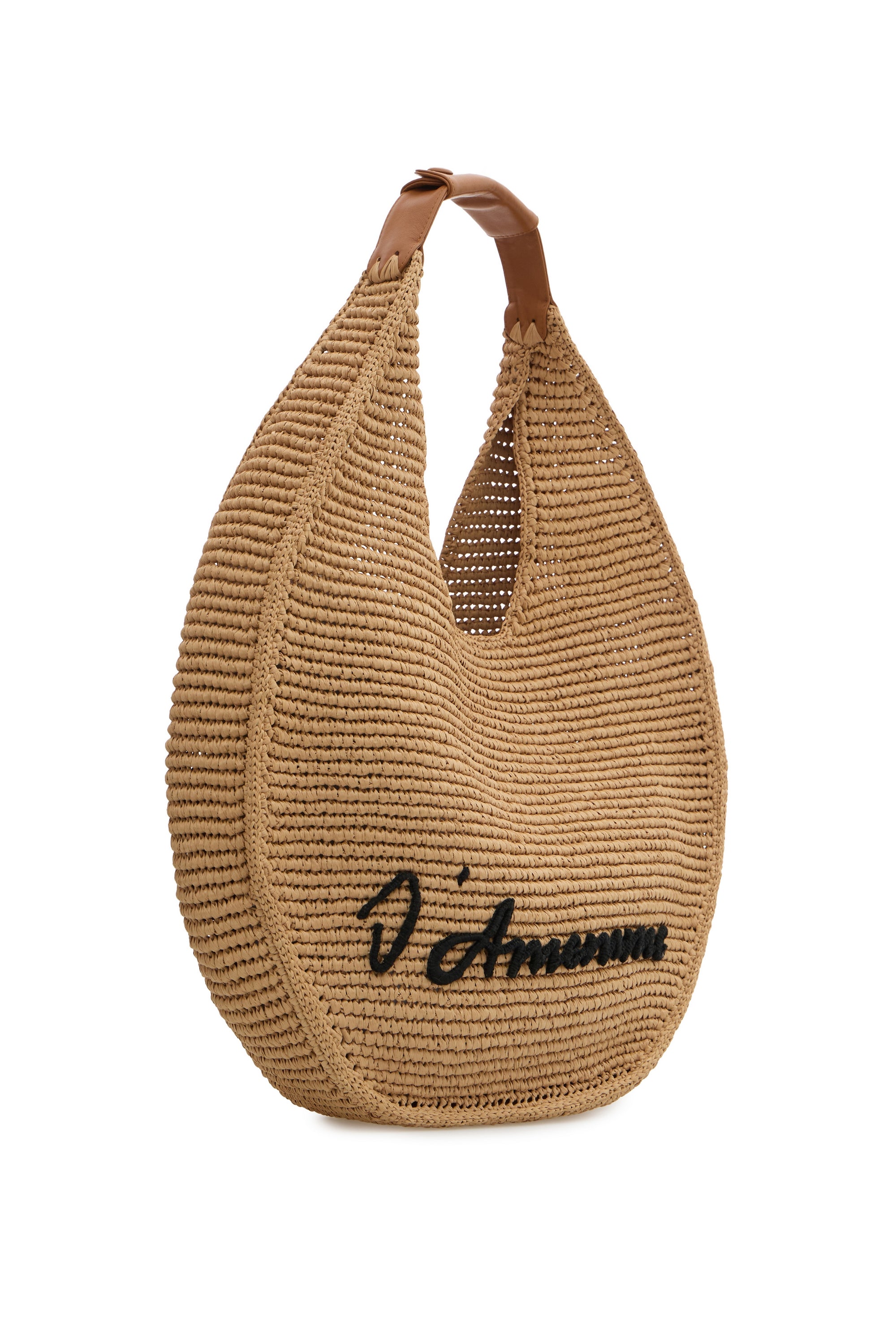 Beige raffia slouch bag from the side, showing the open unstructured weave — J'AMEMME Attica, Resort '27