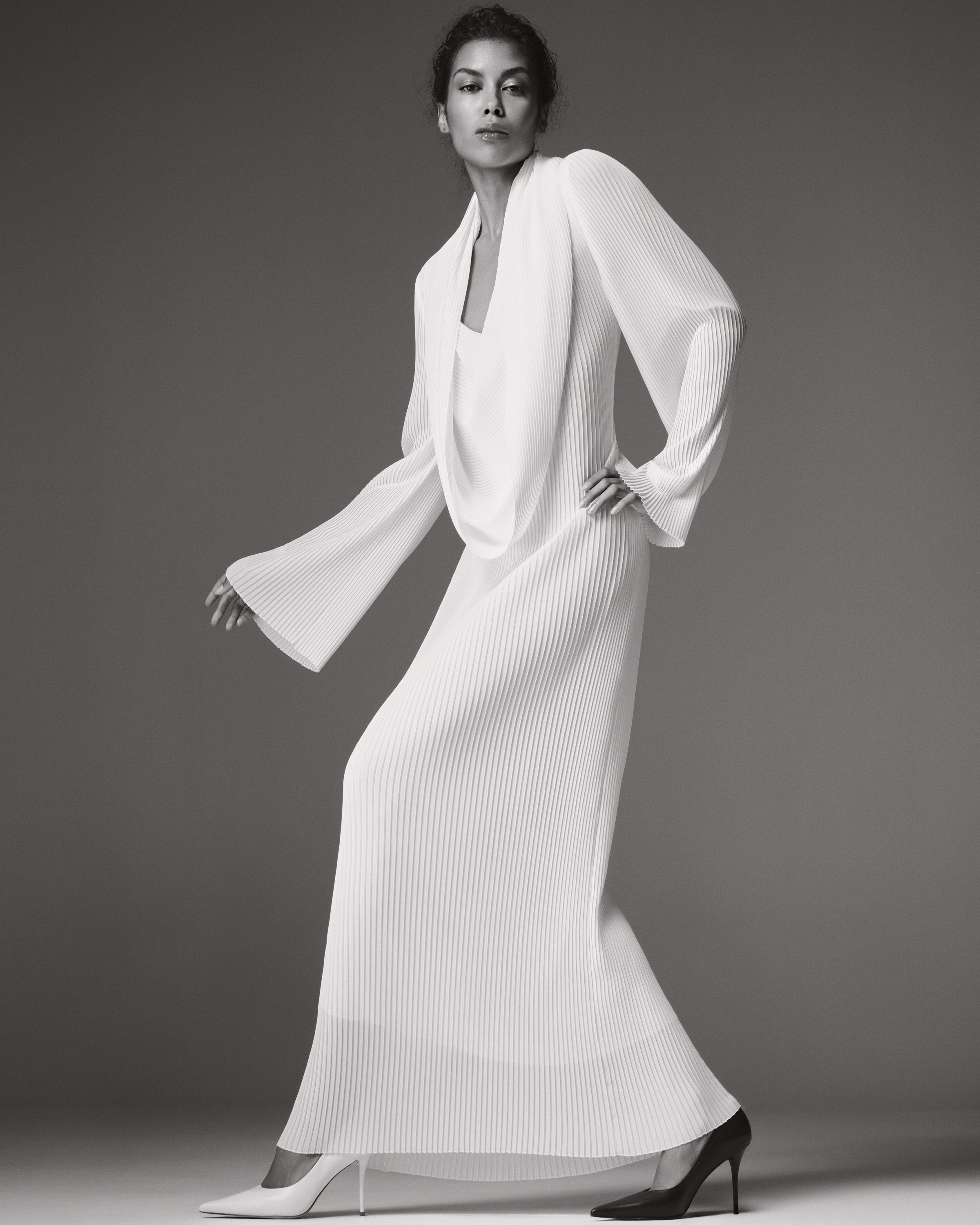Polly Chiffon Dress by J'amemme — three-quarter view showing flared sleeve and pleated skirt