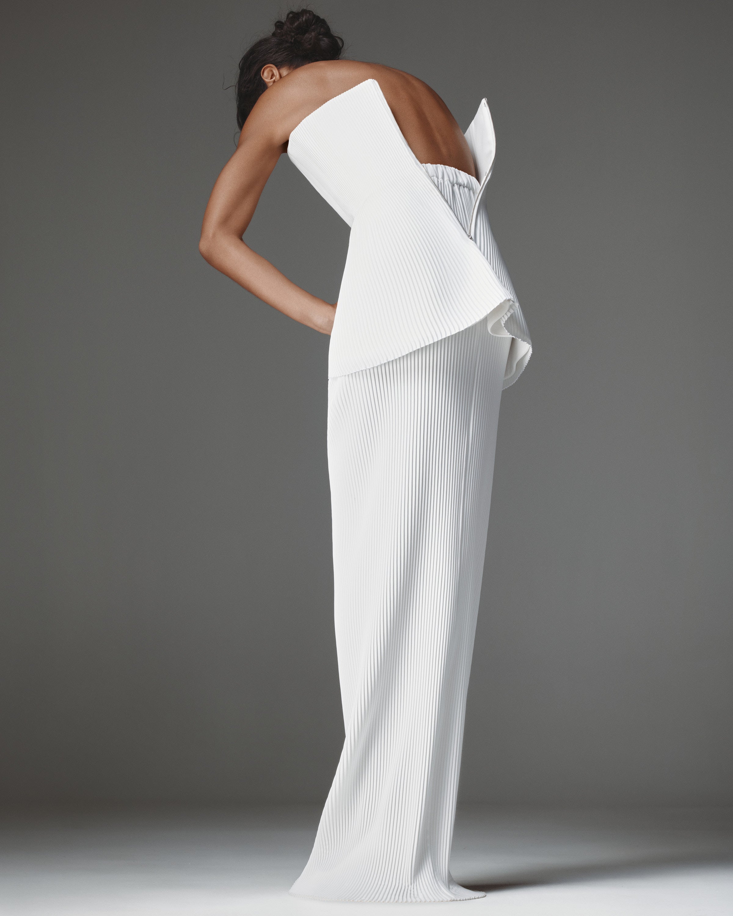Rook Pleated Set by J'amemme — back view showing peplum top, centre-back zip and pleated maxi skirt