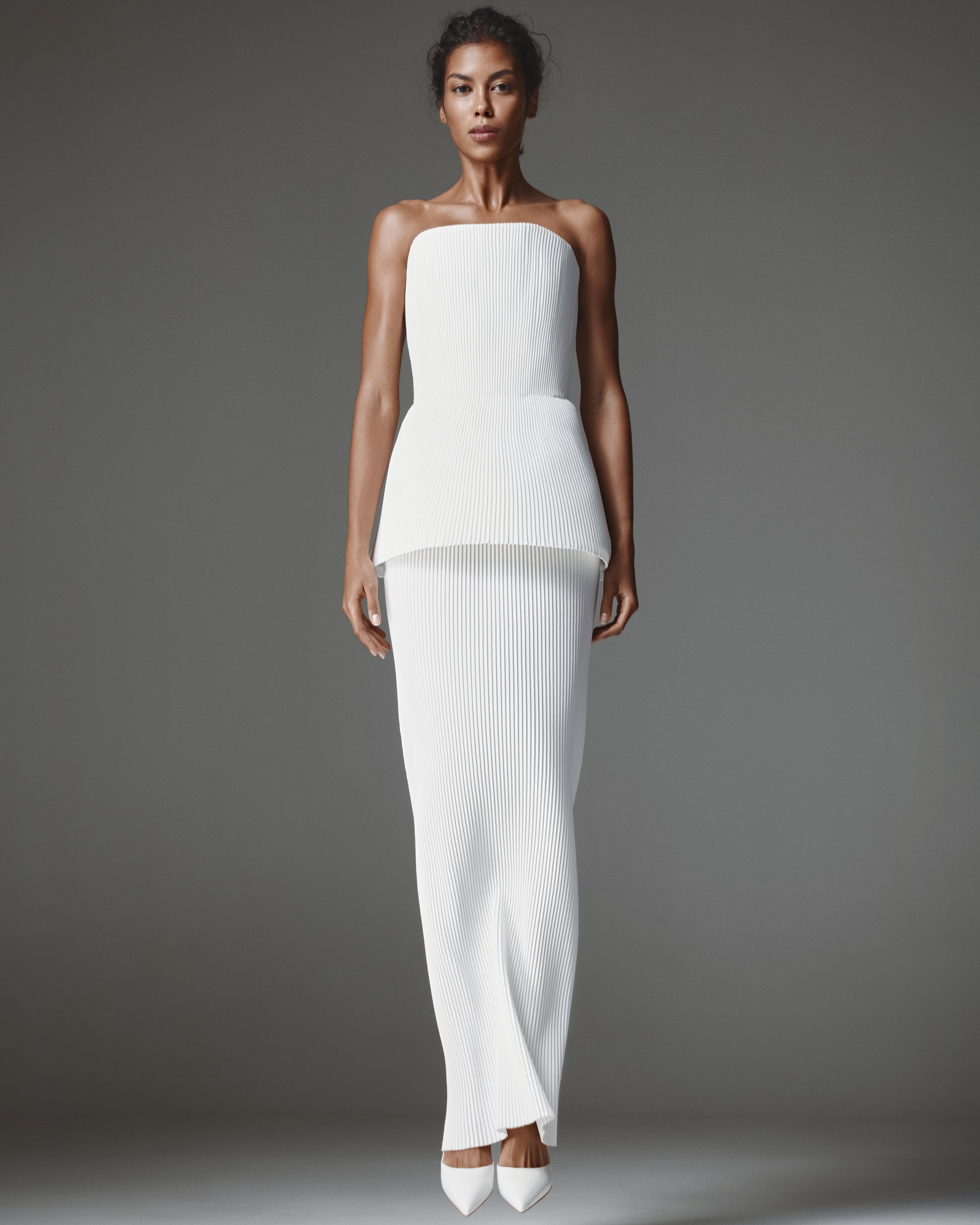 Rook Pleated Set by J'amemme — front view of strapless peplum top with floor-length pleated skirt