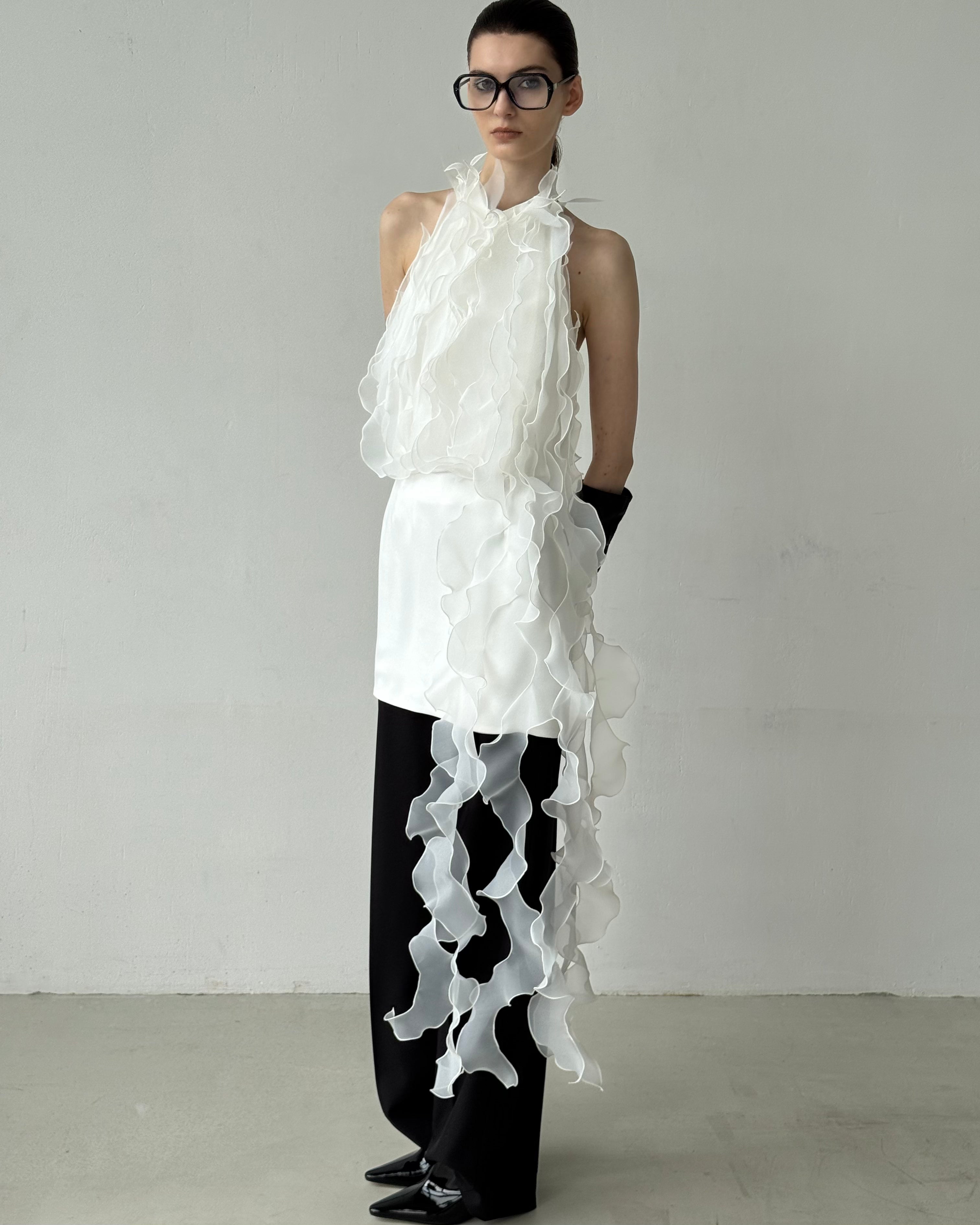 Jellyfish Dress in White by J'amemme — side view, model wearing avant-garde bridal top with flowing organza